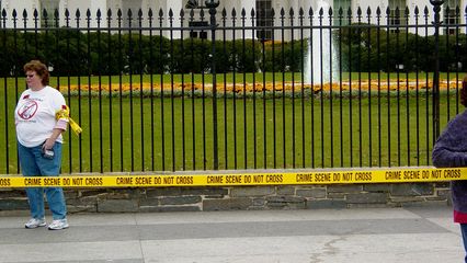 Sheehan was at the White House as part of an anti-war demonstration that sought to make the White House appear to be a crime scene (war crimes, that is).