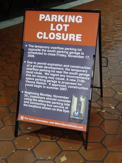 We've seen little signs like this one at Vienna before, and they're never good news. This time, it announced that the overflow parking lot at the end of Vaden Drive, past the South Garage, would be closing for good on November 17.