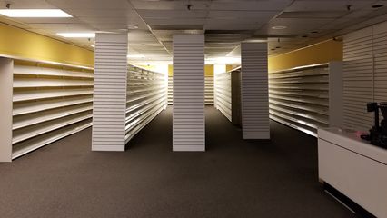 Former Payless ShoeSource space in Main Place Mall.  At the time of our trip, Payless stores all over the country were finishing up their closing sales and vacating their spaces as part of a larger winding-up of the company due to a bankruptcy.