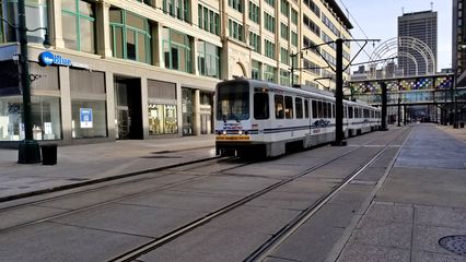 Buffalo Metro Rail vehicle traveling down Main Street.