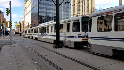 Buffalo Metro Rail vehicle traveling down Main Street.