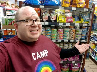 Posing for a selfie with the cat food, now on an endcap.  Muffy did much of her singing and dancing in front of the cat food while here, so a photo with the cat food only seemed fitting.