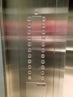 Elevator buttons.  I found it curious that this building has a 13th floor.  Many buildings that have more than twelve floors omit 13, as it is viewed as bad luck.  Our hotel, which went up to 27 floors, omitted 13.