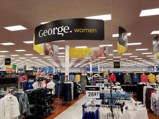 In the States, "George" is one of several private label brands of clothing sold at Walmart, typically on the higher end men's clothing.  Here, "George" is the brand for the clothing department as a whole.
