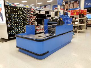 One thing that surprised me was the lack of bagging wheels at Walmart in Canada, seen here at the front registers (left) and the electronics register.