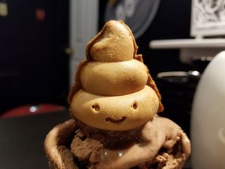 This little poop emoji topped both of our sundaes.