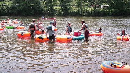 Getting in the river, getting in the tubes, and getting things situated.