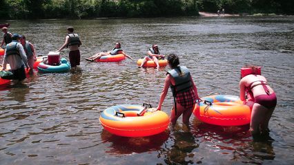 Getting in the river, getting in the tubes, and getting things situated.