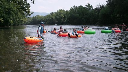 Getting in the river, getting in the tubes, and getting things situated.