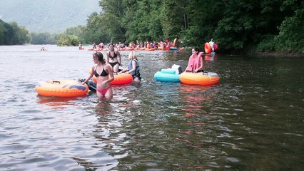 Getting in the river, getting in the tubes, and getting things situated.