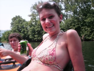 Becca enjoys a Bud Light Lime, and later demonstrates that she has finished it.