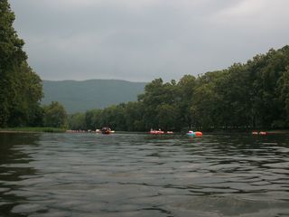 Spread out along the river. Again, note the darker sky compared to earlier in the day.