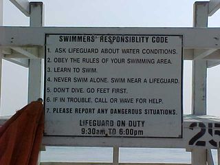 Okay... you're already at the beach, and read number three on the Swimmer's Responsibility Code. "Learn to swim". It seems a little bit late if you're already at the beach, but still a good idea.