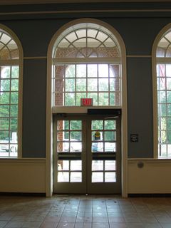 Inside, the building is far more ornate than a regular rest area. Another first - a lobby! In other Virginia rest areas, the closest thing to a lobby is where there is an open-air corridor running down the center of the building on some floorplans. Nothing like this, with climate control, big fan windows, and televisions set to CNN.