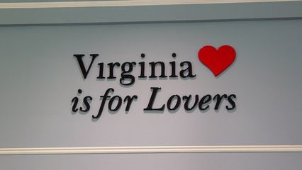 Another first - signage! A "Virginia is for Lovers" sign is on the wall over the center of the lobby, and other signs indicate where the restrooms and vending machine area are located.