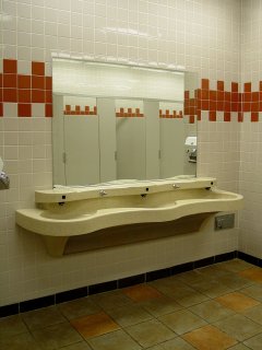The restrooms... wow! This is nice. Big ceramic tiles and a red border make this more upscale than your average rest area.