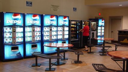 The vending machine area, usually in its own building in other rest areas where it's offered, is located right off the main lobby. It even features indoor seating!