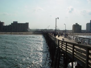 As you can see, this is a long pier, made all the more evident when you're right on top of it, seen at left at the shoreside end of the pier, and at right looking from the far end of the pier. The very tip of the pier appeared to be of recent construction - I don't know if it's a planned reconfiguration of the end of the pier (it fanned out just slightly at the end), or whether this is repairing damage from Hurricane Isabel the year before, which hit Virginia Beach directly.