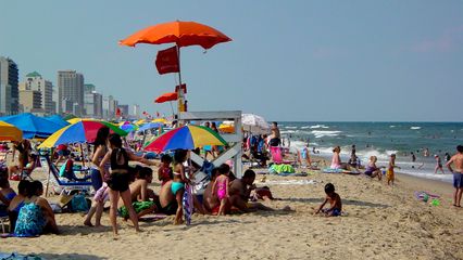 The beach and the ocean were just teeming with people.