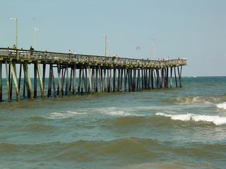 Soon, I approached the fishing pier, jutting out into the ocean.