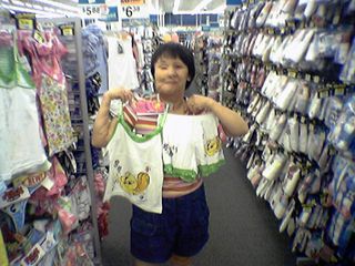 One of Becky's favorite characters is Tweety, as in "I tawt I taw a puddy tat".  And here he is, on a sleepwear set that we eventually bought, that I helped Becky pick out.