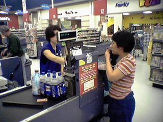 And what is the last stop in a trip to Wal-Mart?  The checkout lanes, of course, where we graced register 13 with our presence.
