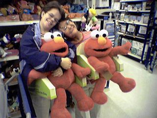 After the ice cream, we stopped by the toy department, where we found these giant Tickle Me Elmo dolls.