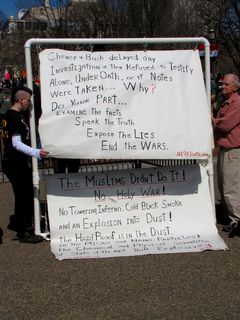 A short distance from the main demonstration, a group of "9/11 truthers" demonstrated.