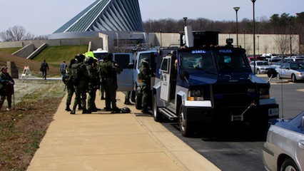 Virginia State Police SWAT vehicle, complete with masked officers.