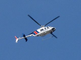 Meanwhile, a Virginia State Police helicopter, tail number N36VA, flew overhead.