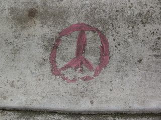 On my DC trip on March 1, I noticed that someone had drawn a peace sign on some concrete in Lafayette Park, and by the looks of it, it had been there for a while...