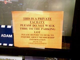 The management of Staunton Mall threw Goody's out to put in a Gold's Gym? First of all, what kind of idiot puts a gymnasium in a shopping mall? And secondly, they're not exactly endearing themselves to the shoppers with that sign. As I understand it, they have to keep the mall entrance open for fire code compliance. However, if you don't want people actually using that entrance, why not just wall in the entrance completely and replace it with a simple emergency exit door? Even more so when you consider that they just put a whole bunch of money in to renovate the space. That would certainly prevent the customer-turnoff sign that local management made there... 