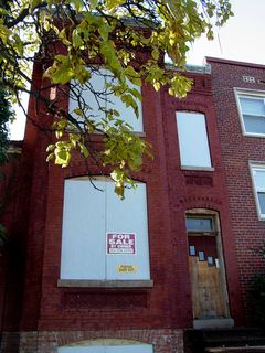 This house, on 8th Street NW in Shaw just north of the Giant Food store and slightly northeast of the Infoshop and convenient to two Metro stations, may look in awful shape with its boarded-over windows, but I see potential. And it's for sale! Of course, I also don't see money, which I would need to buy and renovate this little diamond-in-the-rough... 