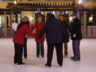 On December 4, I went down to Pentagon City, and encountered the on-air news team for WZDC, a local Spanish-language station affiliated with the Telemundo network, filming a promo at the skating rink. I never did get to see the finished product, unfortunately.