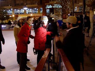 On December 4, I went down to Pentagon City, and encountered the on-air news team for WZDC, a local Spanish-language station affiliated with the Telemundo network, filming a promo at the skating rink. I never did get to see the finished product, unfortunately.
