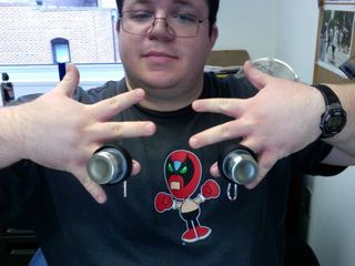 On August 21, I posed for the camera on my office Mac with water bottle lids on my fingers like it's bling or something.