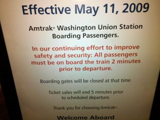 While checking our bags at Union Station in DC, I noticed this sign. This annoyed me because Amtrak is throwing "safety and security" around when this is obviously neither a safety nor a security issue. Let's be honest here: All passengers need to be on board the train two minutes prior to departure so that the train can depart on time. It is a very important concern, but not a matter of safety and security to keep a schedule, unless the passengers will be revolting and subsequently offing the conductor if the train doesn't leave on time. Keeping the schedule is important because if you're delayed leaving one stop, all the subsequent stops will be delayed as well, and that's no way to run a railroad...