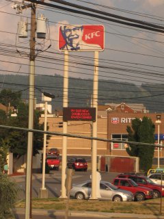 We made a longer-than-usual stop in Cumberland, Maryland. One thing we noticed was the sign on the KFC. Due to a problem with the LEDs on the sign, it appeared to promote their "Idwich" combo. My camera was able to resolve the missing letters, but it certainly was good for a few laughs.