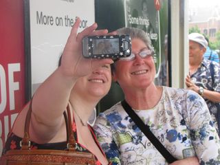 Mom and Sis pose for a cell phone photo, while I get a shot of them posing for said photo - with their camera in my shot, as intended.