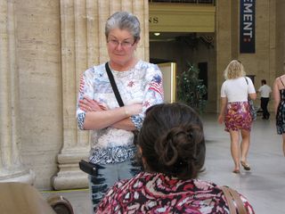 I love this picture, because it looks like Mom is giving Sis the business about something in that what-am-I-going-to-do-with-you kind of way. That's not what it's actually depicting, but it does kind of look like that, no?