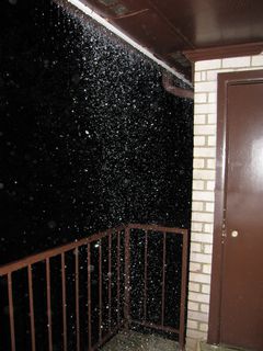 When the replacement gutters went up in April to replace the ones that the snowstorm took out, I gained a new problem. Specifically, when it rains really hard, the gutter over my balcony tends to overflow in this one spot every time. I have a feeling that there's a blockage there, because I can't think of any other reason to explain the gutter's only overflowing right there, seen here during a storm on September 30.