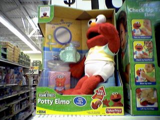 Katie and I later discovered "Potty Elmo", who sings a song about going to the bathroom to the tune of "Pop Goes the Weasel", and ending with a flush sound.