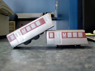 At the Old Town Transit Shop, where a friend of mine works, which I visited on April 27, they have a foam rubber Metro train that somehow got broken in two. My friend said it was their "accident train". Making a bit of a joke about the November 3, 2004 accident at Woodley Park-Zoo, I put the two pieces in this position. I said that if it were really an accident train, it would look more like this, with a train's having telescoped.