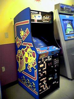 This machine is absolutely awesome. This is the combination Ms. Pac-Man and Galaga machine in the game room at the Lexington Wal-Mart. I've been known to play it quite a bit from time to time. I'd sometimes play Ms. Pac-Man on there, but I'd usually play regular Pac-Man, accessible through an easter egg (up-up-up-down-down-down-left-right-left-right-left on the joystick on the select screen). I could easily play Pac-Man for hours...
