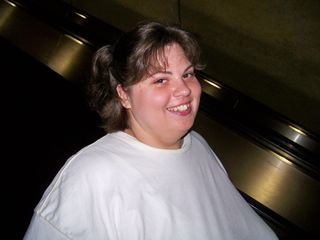 Katie descends the escalator at Wheaton.