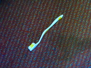 Where we were, in the broken-down cab area, we spotted a discarded toothbrush on the floor. Gross.