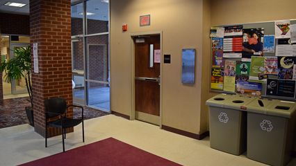 Within two years of my graduating, the vending lobby got a facelift, with the carpeting's being replaced with tile.  The centerpiece was the then-new College of Business logo in the floor.