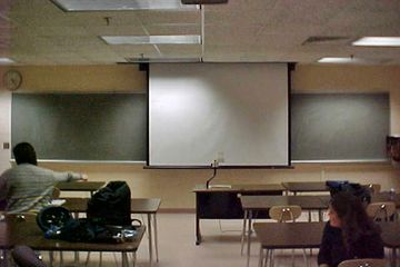 On the second floor, room 202 was painted a tan color, and had a tiled floor.  It had a double chalkboard on the front wall, and a second chalkboard on the side wall.  I took COB 241 (financial accounting) in this room in the fall of 2000, and GECO 200 (introductory macroeconomics) in the spring of 2001.