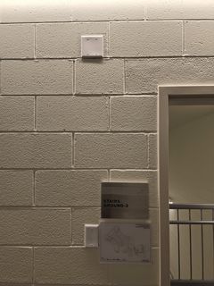 One day in 2003, I randomly got photos of the fire alarm and pull station in the second floor corridor next to the lobby.  I got a photo of the same thing in 2022, showing the spots where the alarms used to be, now plated over.