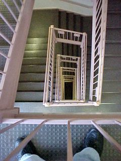 The stairwell in the office tower as originally built was very much a product of its time, with those pink railings and undersides.